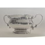 Silver twin handled sugar bowl by Adie Brothers, 1926, wt 4.0ozt. Estimate £45-55.