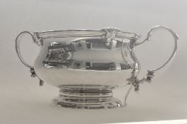 Silver twin handled sugar bowl by Adie Brothers, 1926, wt 4.0ozt. Estimate £45-55.