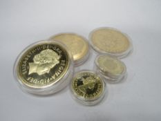 5 gold coloured coins. Estimate £10-20.