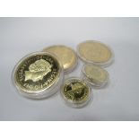 5 gold coloured coins. Estimate £10-20.