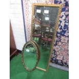 Oval bevel edge mirror with painted fruit frame, height 85cms & a gilt framed bevel edge wall