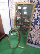 Oval bevel edge mirror with painted fruit frame, height 85cms & a gilt framed bevel edge wall