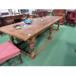 Large elm dining table on heavy bulbous legs with stretchers to floor with clenched ends, 305cms x