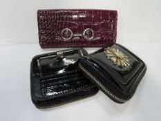 Authentic DKNY patent purse with large enamelled badge at front; authentic Ted Baker buckle purse