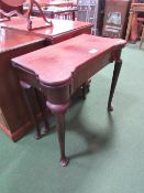 Mahogany 19th century fold-over games table with green baize, a/f on tapered pad supports, open