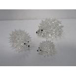 Set of 3 Swarovski crystal hedgehogs, 7.5cms, 5.5cms & 3.5cms. Estimate £20-30.