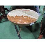 Circular onyx top on brass base side table, 60cms diameter. Estimate £30-40.