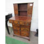 Small flame mahogany writing desk, fold-over tops, storage below over 6 graduated drawers, 61cms x