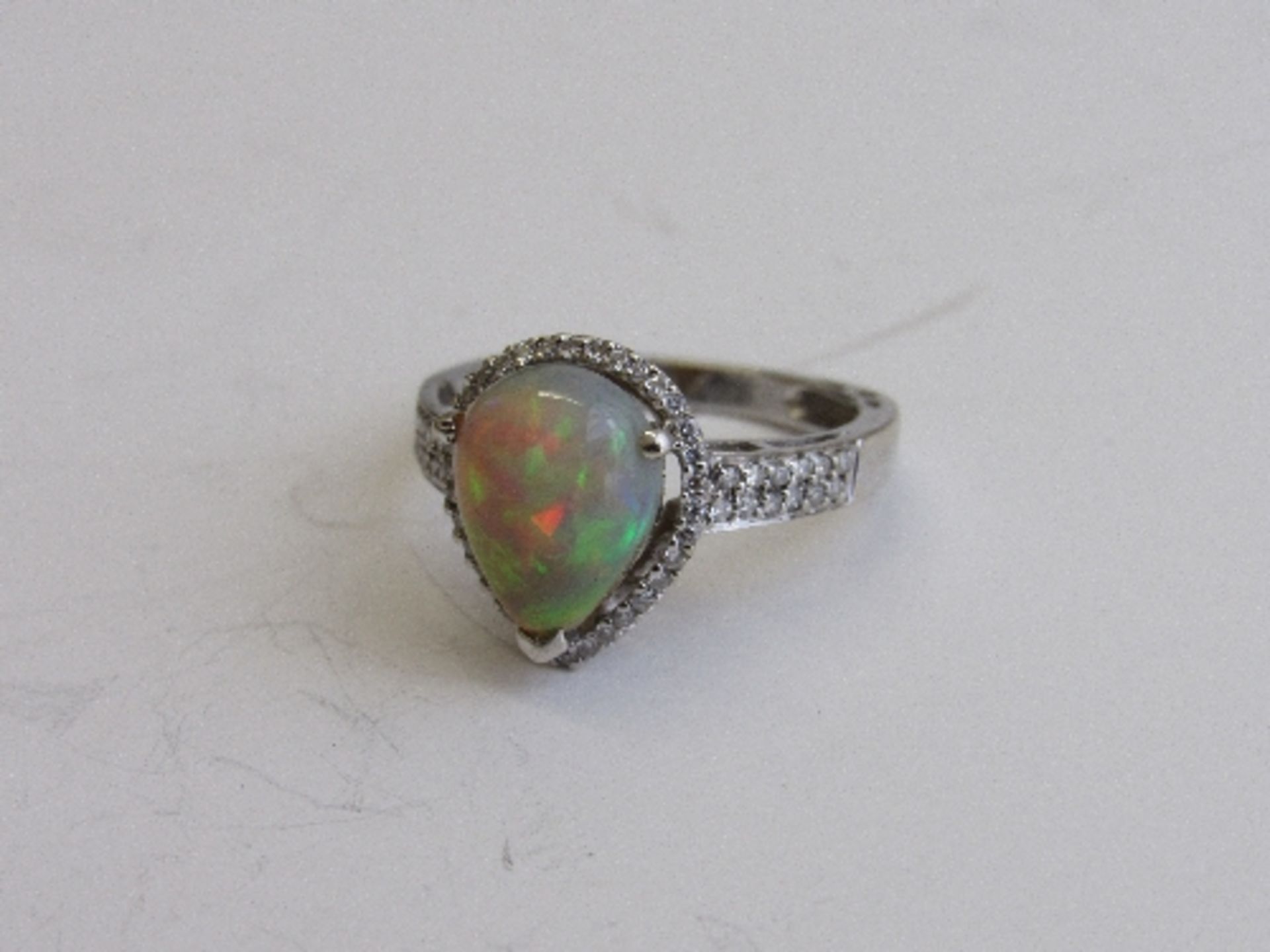 18ct white gold, diamond & pear shaped opal rings, size N. Estimate £850-1,000. - Image 2 of 2