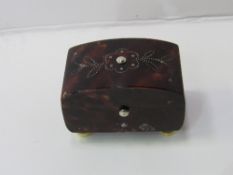 Small tortoise shell box with silver inlay & ivory pads (a/f) sold by S Fisher, 188 The Strand.