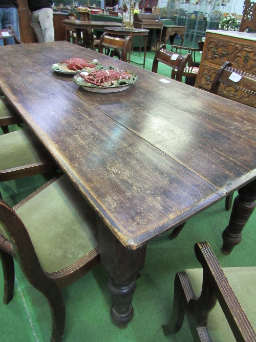 Pine table on turned legs, 226cms x 82cms x 76cms. Estimate £40-60.