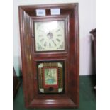 American wall clock by the Waterbury Clock Co. Estimate £10-20.