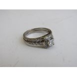 18ct white gold & diamond engagement ring with certificate of authenticity, size N. Estimate £1,