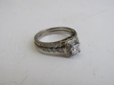 18ct white gold & diamond engagement ring with certificate of authenticity, size N. Estimate £1,