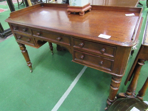 Mahogany writing desk on turned legs to casters, 122cms x 57cms x 77cms. Estimate £80-100. - Image 4 of 4