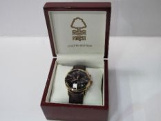 Nottingham Forest Football Club gent's fashion wristwatch. Estimate £10-20.