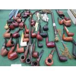 Large collection of smoker's pipes, various hooka pipes & 3 ceramic pipe bowls. Estimate £40-60.
