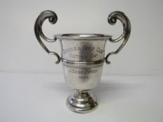 Sterling silver trophy, Sheffield VIII 1936, Walker & Hall, 3.8ozt. Estimate £40-50.