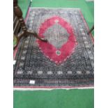 Red ground Pakistan hard-knotted carpet, 196 x 137. Estimate £60-80.