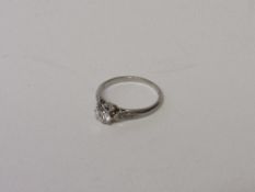 Platinum solitiare diamond ring, size M, weight 2.8gms, c/w purchase invoice dated 1932. Estimate £