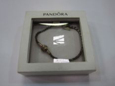 Pandora charm bracelet in Pandora presentation box. Estimate £15-30.