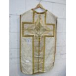 Religious vestment with gold thread decoration. Estimate £20-30.