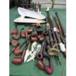 Large qty of smoker's pipes including Meersham-style pipe in case. Estimate £40-60.