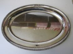 Large oval shaped silver tray with decorative rim & 3 engraved crests, 38.5cms x 53.5cms, weight