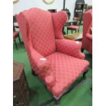 2 upholstered wing armchairs. Estimate £50-80.