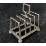 Silver toast rack in excellent condition by Harrison & Howell, Sheffield, 1894, over 4ozt.