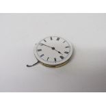 Watch movement with white enamel face, diameter 3cms. Estimate £10-20.