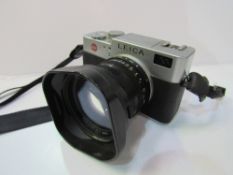 Leica Digilux 2 & Leica 1:2.0 2.4/7-22-5 lens in original box. Estimate £20-30.