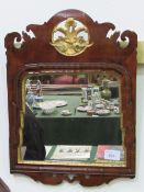 18th century Chippendale-style mahogany & parcel gilt wall mirror. Estimate £80-120.