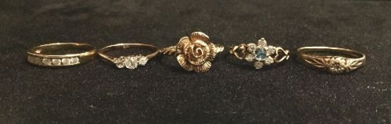 5 gold rings, 4 set with stones, some diamonds. Estimate £100-120.