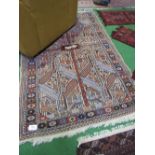 Old Afghan rug with animal & geometric designs, 186 x 120. Estimate £30-50.
