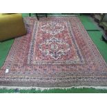 Antique pink ground Afghan (Herat) carpet, 272 x 200. Estimate £100-150.