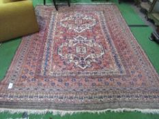 Antique pink ground Afghan (Herat) carpet, 272 x 200. Estimate £100-150.