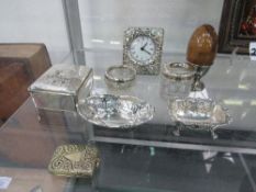 2 small hallmarked silver dishes; 2 hallmarked silver top glass pots; silver cased quartz clock;