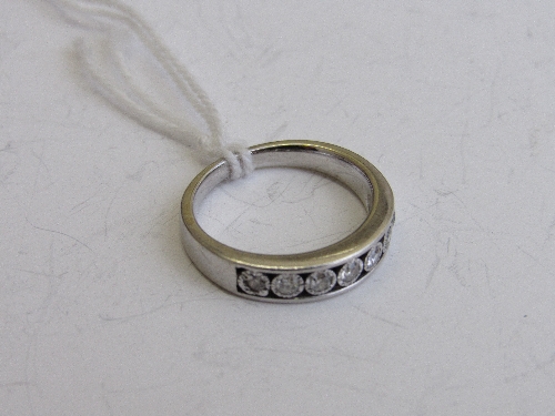 9ct white gold 7 stone half eternity ring, size J, weight 2.3gms. Estimate £70-90.