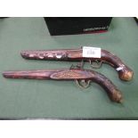 Pair of vintage decorative flintlock pistols with profuse boule & mother of pearl inlays.