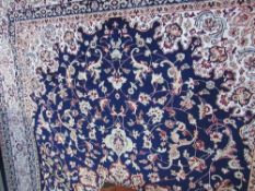 Blue ground Keshan carpet, 3m x 2m. Estimate £80-100.