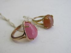 2 gold overlay on silver rings with pink stone & brown stone, sizes P & R. Estimate £50-60.