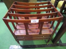 Mahogany Canterbury with 2 drawers on small brass castors. Estimate £30-50.