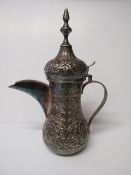 Turkish silver teapot with foliage decorated (tested silver), weight 23ozt. Estimate £120-140.