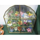 Glass cabinet containing 14 various butterflies