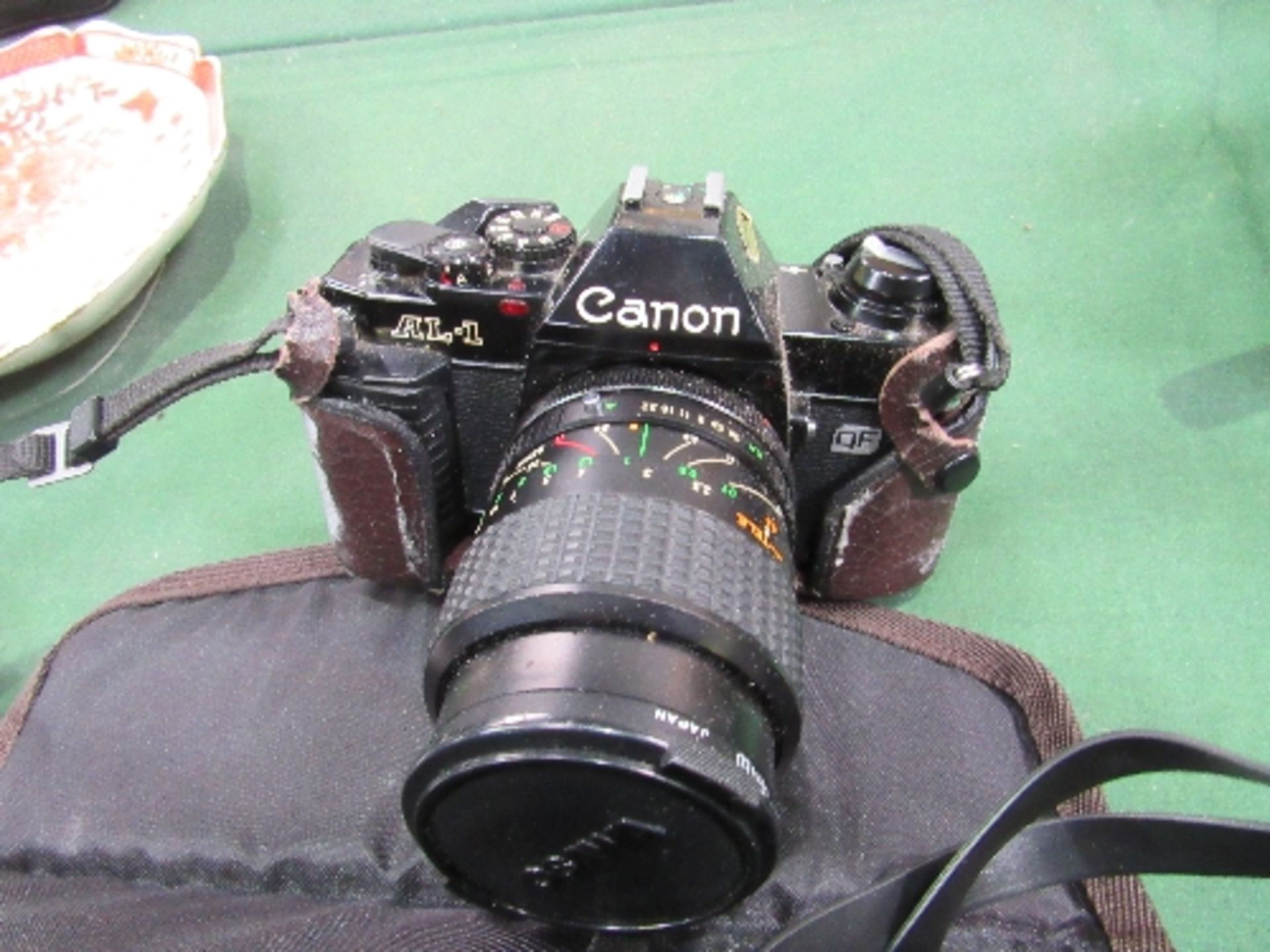 Canon AL-1 camera & Osawa 52mm lens, Osawa F150mm zoom lens & a Canon flashgun all in a canvas