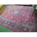 Red ground Persian-design carpet, 390 x 274. Estimate £200-250.