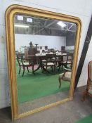 Large gilt framed over mantle mirror, 152cms x 116cms. Estimate £80-100.