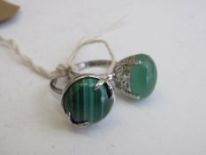 2 silver & green stone rings, both size Q. Estimate £35-55.