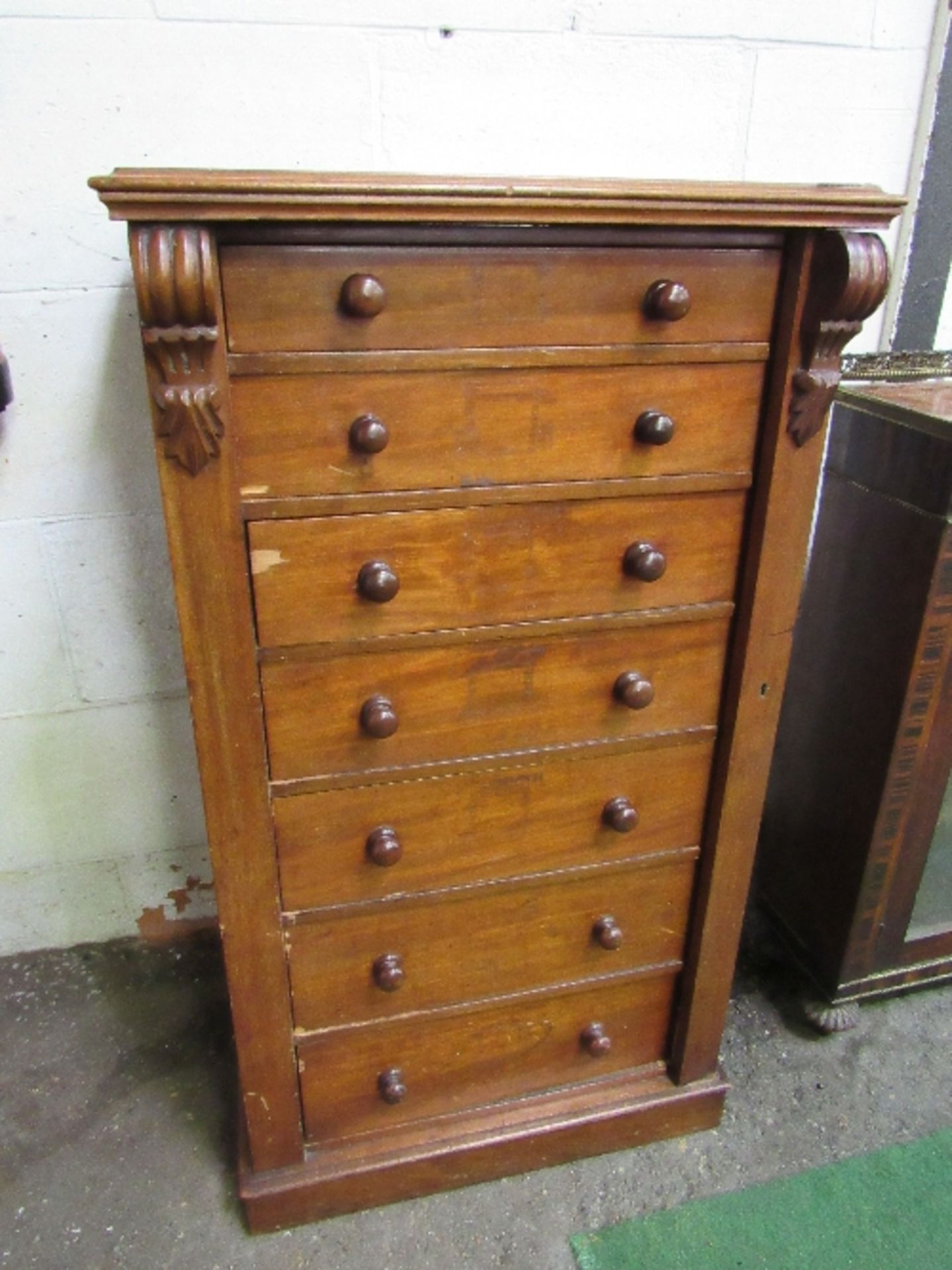 Mahogany Wellington chest, complete with key, 61cms x 45cms x . Estimate £40-60.